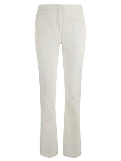 Genny Concealed Fitted Trousers In Cream