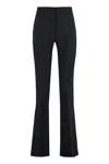 Genny Tight-fitting Trousers With Slightly Flared Legs In Black