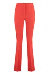 Genny Pressed-crease Flared Tailored Trousers In Orange