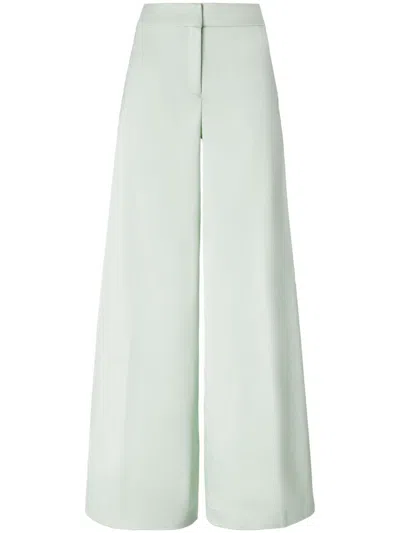 Genny Flared Wide-leg Trousers In Green