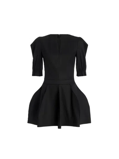 Genny Peplum Mini Dress In Animal Print