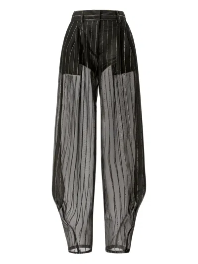 Genny Pinstriped Sheer Trousers In Black