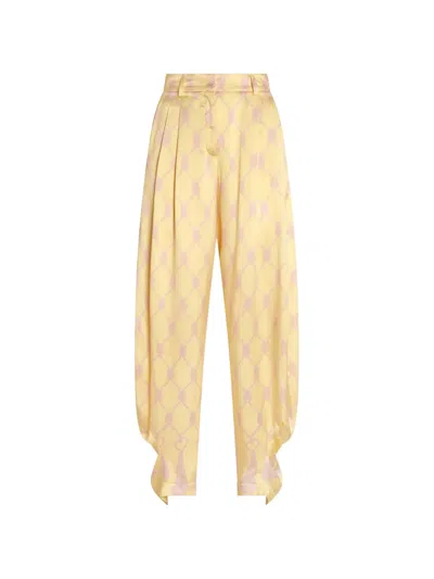 Genny Silk Printed Trousers In Yellow
