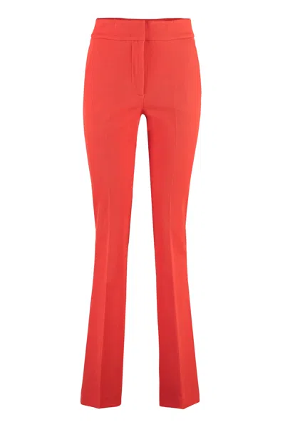 Genny Virgin Wool Blend Flared Trousers In Red