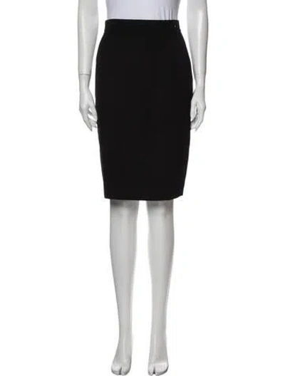 Pre-owned Genny Wool Knee-length Skirt In Black