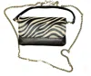 German Fuentes Women's Leather Cowhide Crossbody And Clutch In Tiger Print In Animal Print