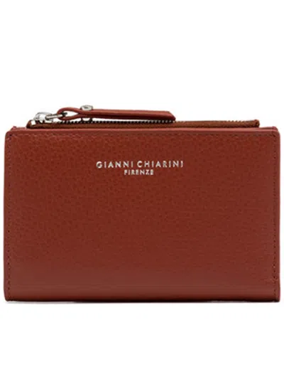Gianni Chiarini (b) The Name And Address Of The Manufacturer;