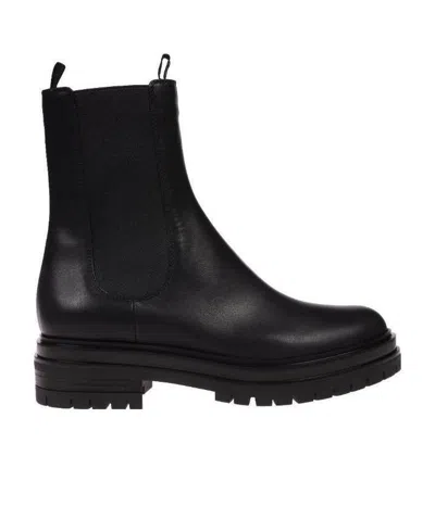 GIANVITO ROSSI GIANVITO ROSSI ROUND-TOE SLIP-ON COMBAT BOOTS