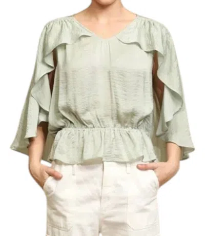 Gigio Cape Sleeve With Ruffle Detail Blouse In Light Sage
