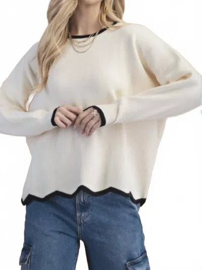 Gigio Wavy Hem Sweater In White In Neutral