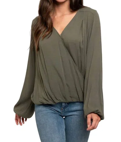 Gilli Long Sleeve Wrap Blouse In Olive In Green