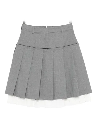 GIMAGUAS LAYERED PLEATED MINI SKIRT