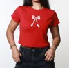Girl Dangerous Holiday Bow Baby Tee In Red In Red