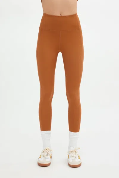 Girlfriend Collective Caramel Compressive Pocket Legging In Brown