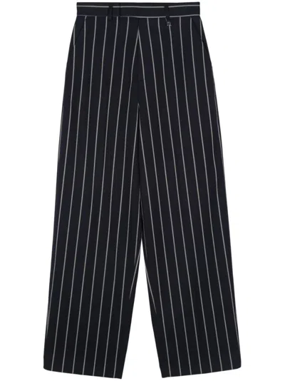 Giuseppe Di Morabito Logo-plaque Trousers In Blue