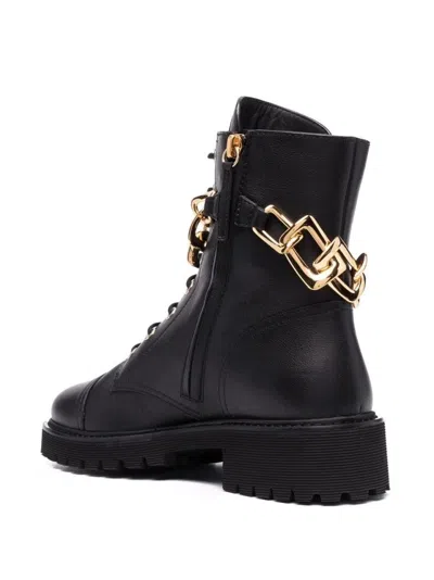 GIUSEPPE ZANOTTI BLACK LEATHER BIKER BOOTS WITH OVERSIZED GOLD CHAIN DETAIL