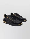 Giuseppe Zanotti Low Top Sneakers With Round Toe And Gold Accents In Black