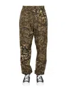 Givenchy 4g Animal-print Track Pants In Green