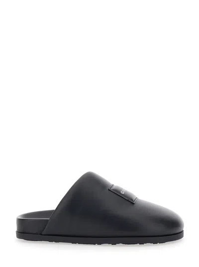 Givenchy Asymmetrical Padded Leather Logo Flat Mules In Black