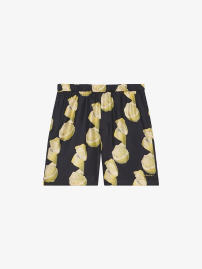 Givenchy Bermuda Shorts In Printed Silk In Black/yellow
