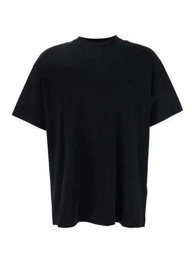 GIVENCHY GIVENCHY MEN BLACK CREWNECK T-SHIRT WITH EMBOSSED LOGO ON FRONT IN COTTON MAN