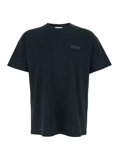 GIVENCHY GIVENCHY MEN BLACK CREWNECK T-SHIRT WITH LOGO PATCH ON THE FRONT IN COTTON MAN