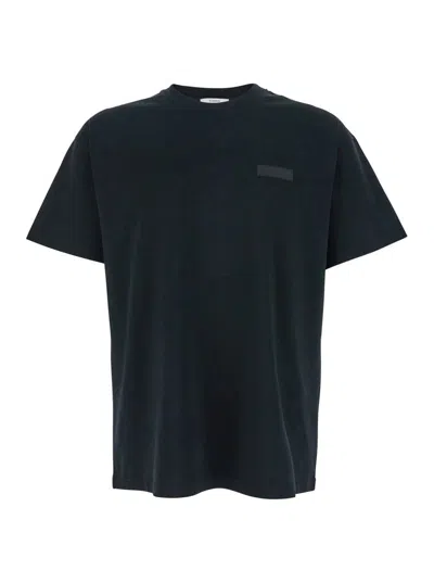 GIVENCHY BLACK CREWNECK T-SHIRT WITH LOGO PATCH ON THE FRONT IN COTTON MAN