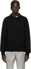 Givenchy Embroidered Logo Wool Sweater In 001-black