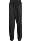 Givenchy Relaxed Fit Logo Embroidered Track Pants In Black