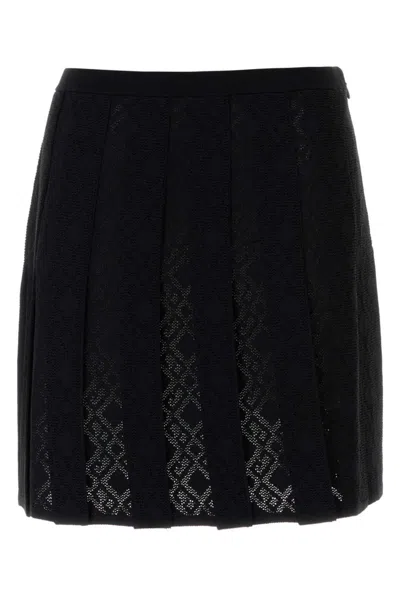 GIVENCHY BLACK PLEATED SKIRT IN MONOGRAM 72 JACQUARD