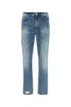 Givenchy Washed Denim Tapered Leg Jeans With Contrast Stitching In Blue