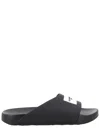 Givenchy Label Slide Flat Mules In Rubber In Black