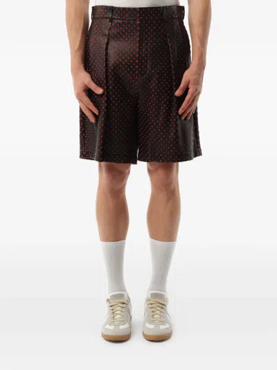 Givenchy Cross-embroidered Leather Shorts In Black