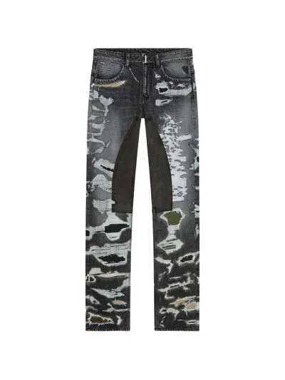 Givenchy Distressed Patched Jeans In Blue
