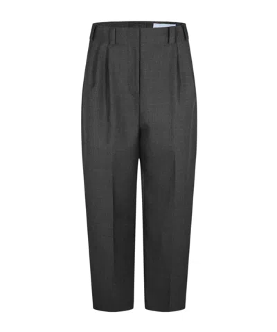 Givenchy Pleated Wool Tapered Pants In Gray