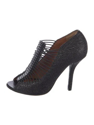 Pre-owned Givenchy Embossed Leather Cutout Accent Pumps In Black