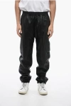 Givenchy Embossed-4g Pattern Leather Trousers