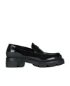 Givenchy Embossed-logo Loafers In Black