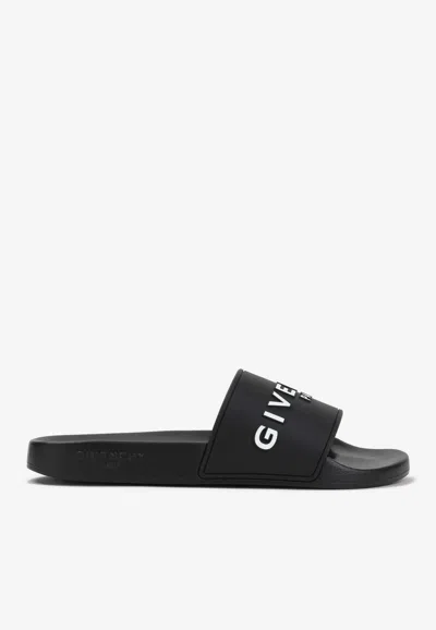 Givenchy Embossed Logo Rubber Slides In Black