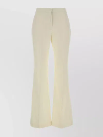 GIVENCHY FLARED WOOL TROUSERS FEATURING BELT LOOPS