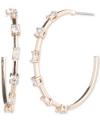 GIVENCHY GOLD-TONE CRYSTAL C HOOP EARRINGS, 1"