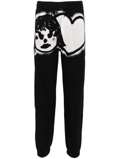 Givenchy Graphic-printed Track Pants In Black