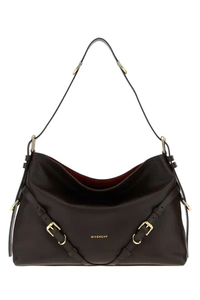 Givenchy Handbags. In Brown