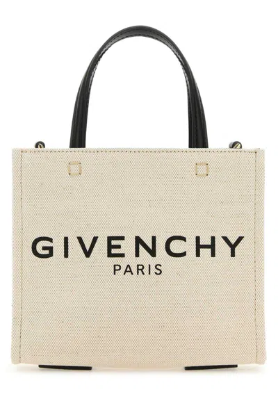 Givenchy Handbags. In Brown