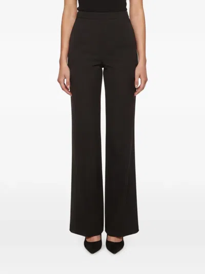 Pre-owned Givenchy High-waisted Trousers In Black