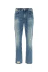 Givenchy Washed Denim Tapered Leg Jeans With Contrast Stitching In Blue