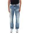 Givenchy Washed Denim Tapered Leg Jeans With Contrast Stitching
