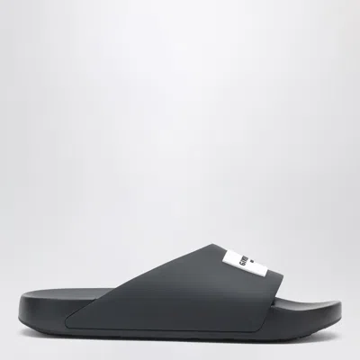 GIVENCHY GIVENCHY LABEL FLAT MULES IN BLACK RUBBER