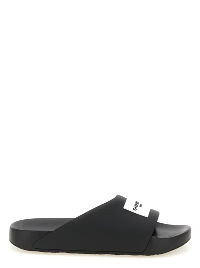 Givenchy Contoured Footbed Logo Slipper For Women In Black