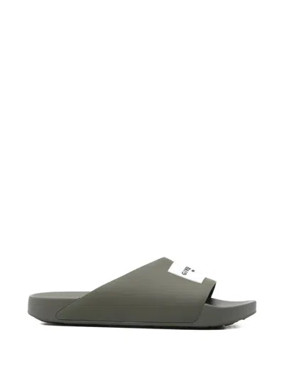 Givenchy Label Slide Flat Mules In Rubber In Gray